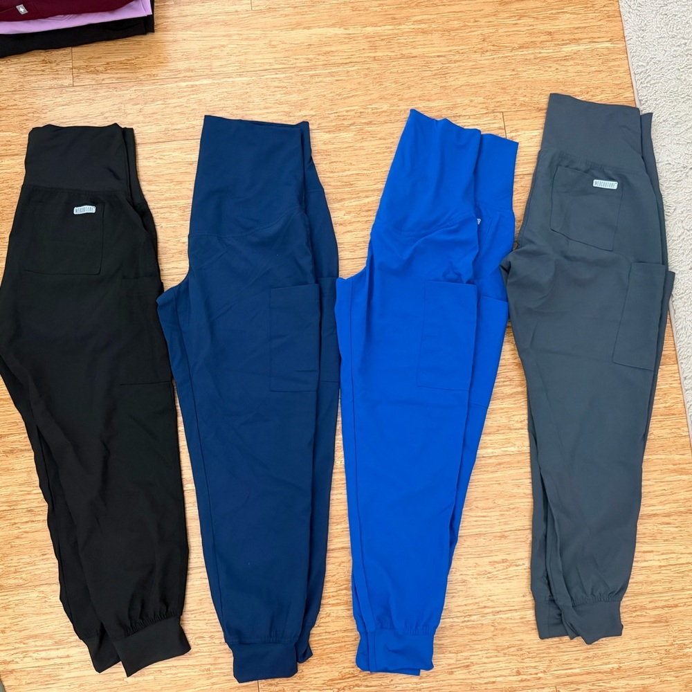 Four Med Couture Maternity Scrub Pants in Black, Navy, Royal Blue, and Charcoal